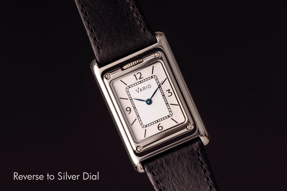 Silver dial and rectangular reversible case of the Vario VERSA Dual Time watch